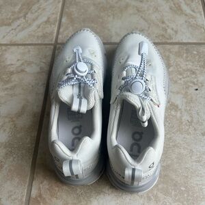 On Running White and Gray Sneakers